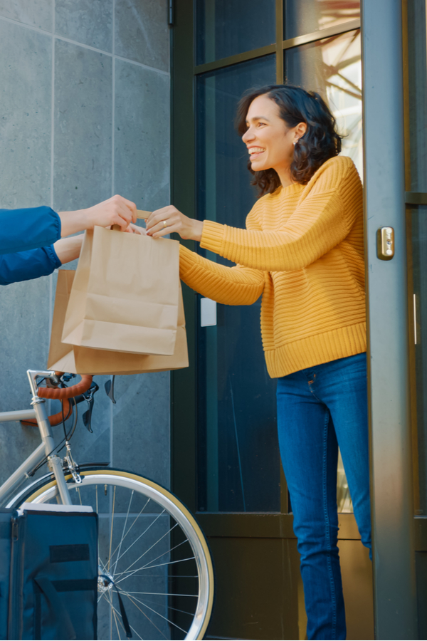 food being delivered to a woman