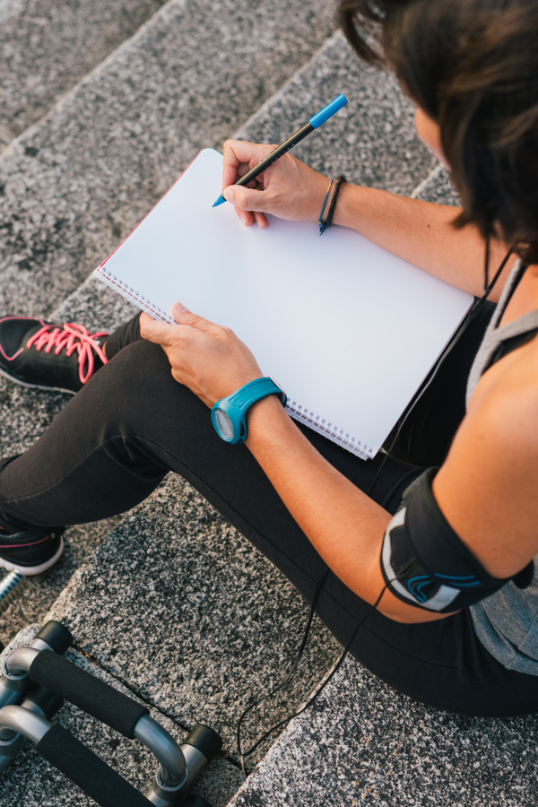 woman making a plan to finally lose weight